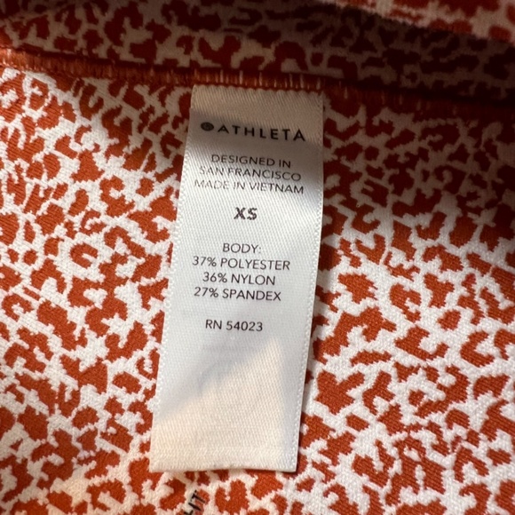 Athleta Salutation Stash II Textured Tight Rust Micro Cheetah Print Leggings - Picture 8 of 9